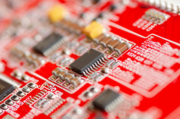 Computer board hardware motherboard microelectronics Server CPU chip semiconductor circuit core red technology background or red texture with processors concept electronic