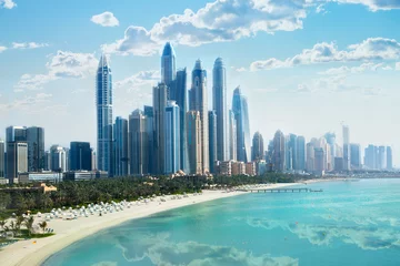 Foto op Aluminium Dubai, Verenigde Arabische Emiraten, Verenigde Arabische Emiraten. Stad van wolkenkrabbers, de jachthaven van Dubai in de zonnige dag met frontlinie van strandhotels en blauw water van de Perzische golf © IRStone