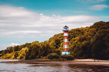 Lighthouse at the river Elbe on a bright sunny day, Blankenese in Hamburg, Germany