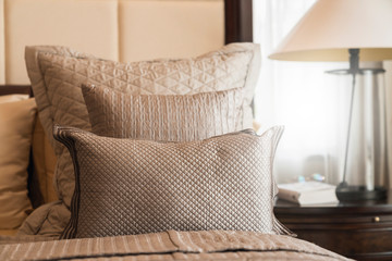 close up white beige soft pillows on bed and blanket bedroom interior design concept.bed maid luxury ideas concept