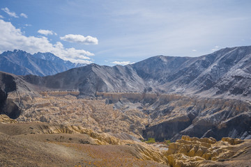 Obraz premium A view of slope hills of the mountain looks like the land of the moon. Called Moon Land of Lamayuru Leh, Ladakh, India.