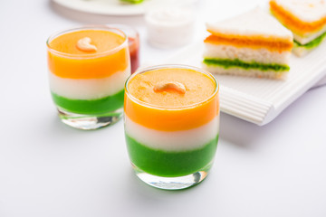 Tiranga / Tricolour sweet food made using indian flag colours and served in a glass in layers....