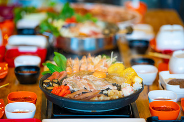 Selective focus Shabu Shabu and Sukiyaki, Japanese food with grill and pot boil