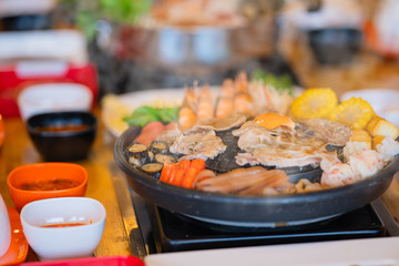 Selective focus Shabu Shabu and Sukiyaki, Japanese food with grill and pot boil