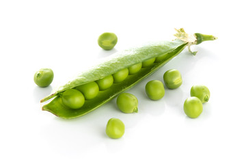 stalk of green peas on a white background