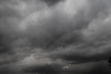 Scenery of black thunderstorm cloudy sky in rainy season. 