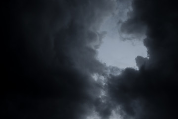 Naklejka na ściany i meble Scenery of black thunderstorm cloudy sky in rainy day. 