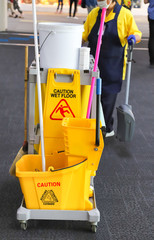 Closeup of janitorial, cleaning equipment and tools for floor cleaning. Vertical view.