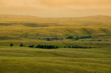 Fototapeta na wymiar Steppe sunset hills landscape summer travel