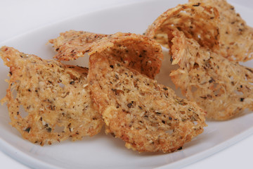 Homemade cheese chips. Crunchy chip from cheddar, parmesan, herbs, spices