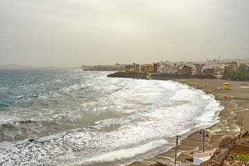 Statue of Greek God Neptune at Melenara Beach on Gran Canaria Island