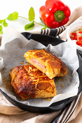 Food concept Fresh baked homemade ham cheese pie in skillet iron cast with copy space