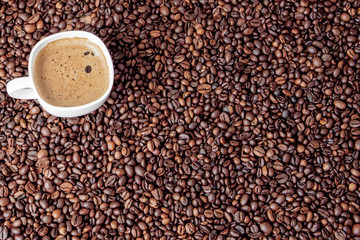 Coffee cup on wooden table. View from top