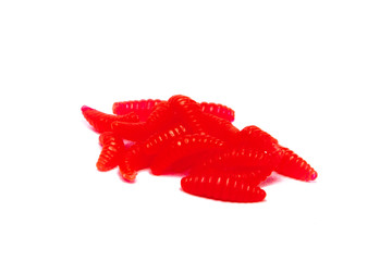 Red Artificial fishing larvae of insects on white background with soft shadow