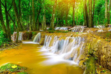 Obraz na płótnie Canvas Waterfall in Tropical Rain forest ,Pa Wai Waterfall,Tak Province, Thailand
