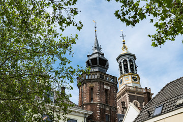 Fototapeta na wymiar towers of City hall and gate called Nieuwe Toren in Kampen, The Netherlands