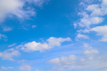 Naklejka na ściany i meble Cloudy blue sky insunny day.