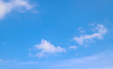 Obraz na płótnie Canvas Cloudy blue sky in sunny day.