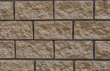 brick wall yellow background.