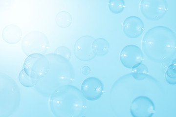 blue soap bubbles background.