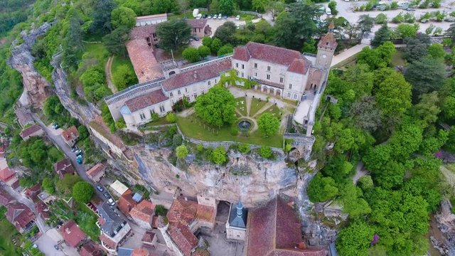 Aerial view of Castle of Rocamadour and gardens.  Castle is located on the edge of a cliff, above the village of Rocamadour with views to all the valey. Lot department in southwestern France
