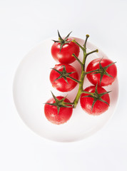 Cherry tomato on white background.