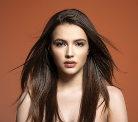 Naklejka premium Beautiful model with long straight hair