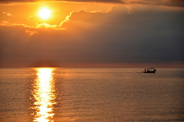 Fishing boat at sunrise