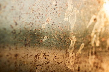 Dirty and greasy grunge texture from oven glass of a professional kitchen restaurant pizza dry...