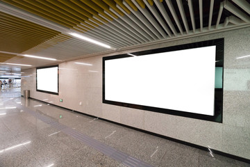 Light box advertising at subway station passageway
