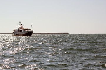 ship with tourists at sea