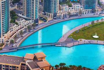 Dubai mall fountain and modern downtown buildings 