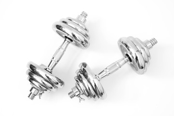 silver iron dumbbell isolated on white