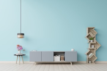 Stand TV in modern empty room blue wall. 3d rendering