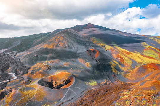 View of the active volcano Etna, extinct craters on the slope, traces of volcanic activity.