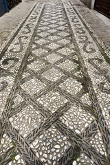 paved floor with mosaic