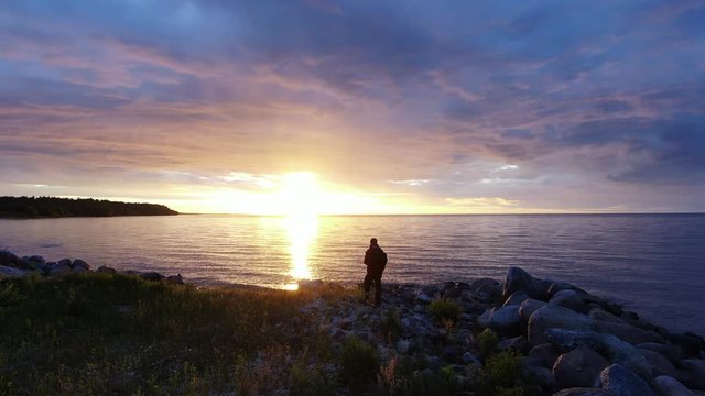 man at sunset Shot on drone