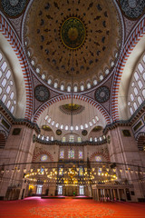 Fototapeta na wymiar The beautiful interior of Suleymaniye Mosque, the second largest mosque in Istanbul, built in 1550, Istanbul, Turkey