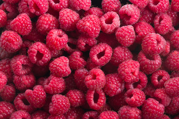 Fresh ripe raspberries background