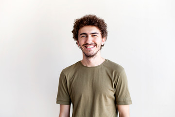 Fototapeta na wymiar Portrait Of Young Handsome Man Smiling