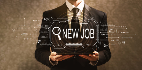 Searching new job theme with businessman holding a tablet computer