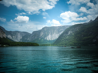Panoramic view on lake in Hallstattt with Alps on background. Hallstatt, Salzkammergut region, Austria, June 15, 2019.