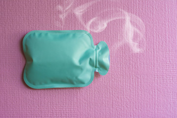 Close up woman has abdominal pain, woman's belly with hot water bottle,Close up woman use Hot Pack