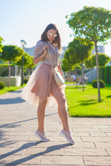  Girl, peach color  skirt, beige blouse, handbag, sunglasses, street, sneakers