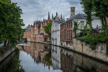 Fototapeta na wymiar Canals of Bruges (Brugge), Belgium. Summer evening view.