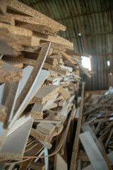 Taking photographs of wood plywood, used for making pellets