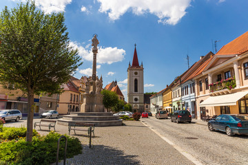 Fototapeta na wymiar Blatna city. View of a old city square with church. Czech Republic.