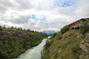 Fototapeta na wymiar Tutshi River Canyon in Canada with a view of mountains