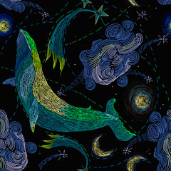 Embroidery, blue whales float in universe among stars. Symbol of imagination and dreams. Modern fashion seamless pattern template for clothes, tapestry, t-shirt design. Astrology illustration