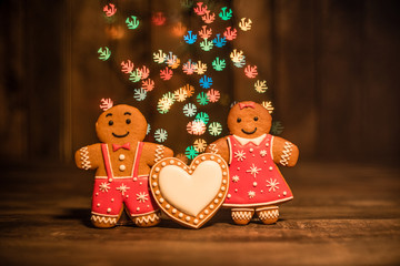 Christmas homemade gingerbread cookies on wooden table. It can be used as a background